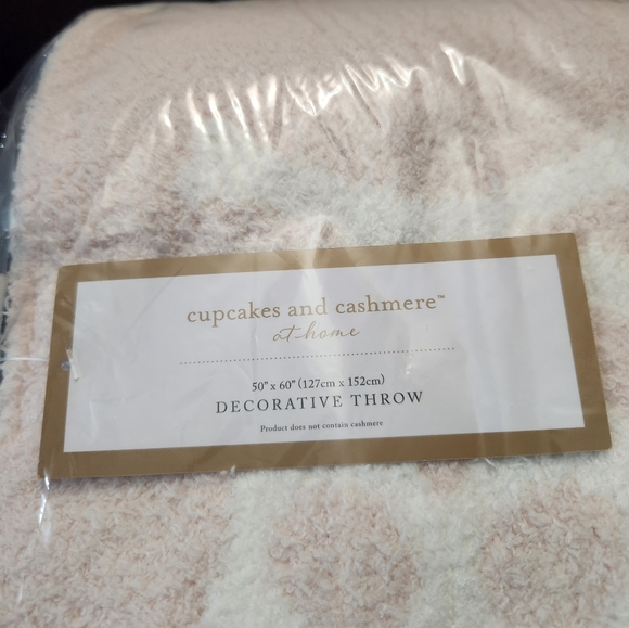 cupcakes & cashmere Pink and White Skull Throw Blanket